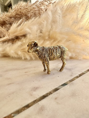 Solid brass sheep sculpture