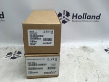 Symbol scanner and cradle