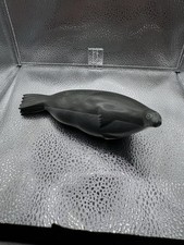 Tricheco pietra intagliata a