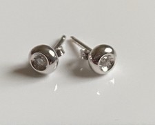 Orecchini punto luce in Oro