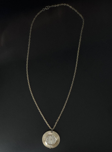 Collana medaglione orologio