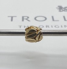 Perlina Trollbeads oro moka