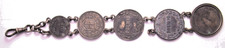 BRACCIALE / PENDAGLIO  CON MONETE E MEDAGLIE IN ARGENTO
