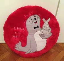 Cuscino tondo Benetton con la