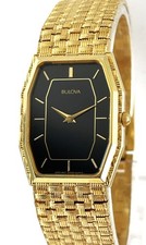 Vintage Bulova Quartz Very Thin Gold Tone Mens Octagon Dress Watch 1985