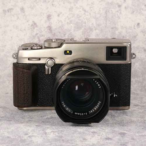 Impugnatura per fotocamera - , in