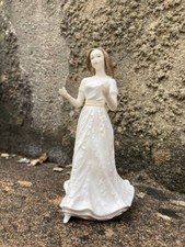 Statuina in porcellana ROYAL DOULTON. England.