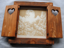 Finestra in legno con scuri