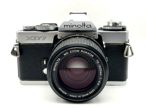 Minolta 75 - +,