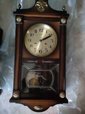 Orologio vintage da parete in legno