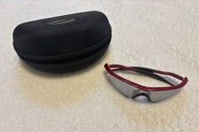 Occhiali da sole Oakley montatura M rosso metallizzato - ibrido ardesia iridio S - come nuovi