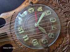 chitarra con orologio