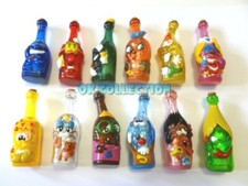 KINDER FERRERO MERENDE SBOTTIGLIATI serie completa 12 pezzi CON LA LORO SORPRESA