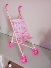 Giocattolo passeggino per
