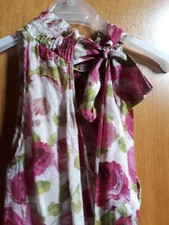 Vestito asimmetrico in cotone a stampa floreale e fiocco sul dietro Benetton S