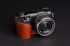 Custodia mezza fotocamera in