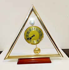 OROLOGIO da tavolo con pendolo  a forma triangolare   cm 30x33