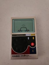 Casio 1982 Vintage LCD Cosmo Fighter gioco elettronico CG-110 - testato e funzionante