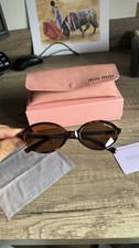 Lunettes de soleil MIU MIU