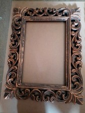 Cornici per specchi in legno