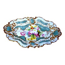 Antico centrotavola floreale