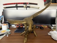 scultura in bronzo aquila