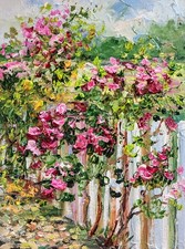 Rose cespuglio su recinzione