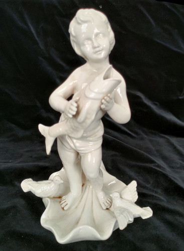 Statua bimbo putto - bimbo, su