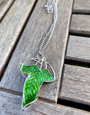 catenina e pendente/ spilla