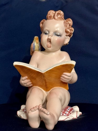 Putto che canta firmato - che, in