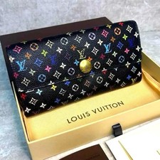 LOUIS VUITTON Portafogli Sara