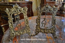 Antica coppia di cornici da tavolo in bronzo