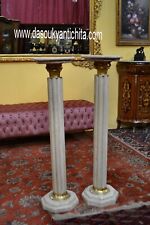 Coppia di colonne-piedistalli in marmo beige