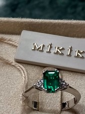 Anello oro bianco 18  carati,con smeraldo taglio emerald con diamanti naturali 