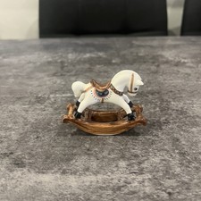 Miniatura cavallo a dondolo