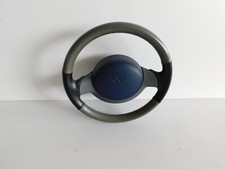 Volante in pelle grigio nero