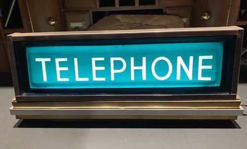 Insegna cabina telefonica