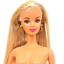 Bambola e supporto Barbie