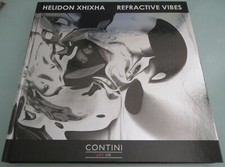 Helidon Xhixha. Refractive