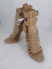 Schutz Charley-Louise Atando