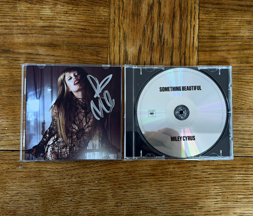 Miley cyrus something - miley,