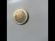 2€ 2006, giochi invernali di Torino. Materiale in più sotto la "R" bordo esterno