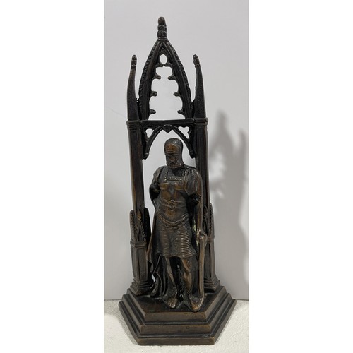 Antica statua fermalibri arco