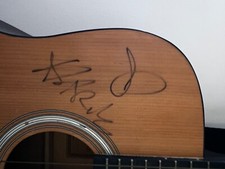 HARRY STYLES SIGNED GUITAR