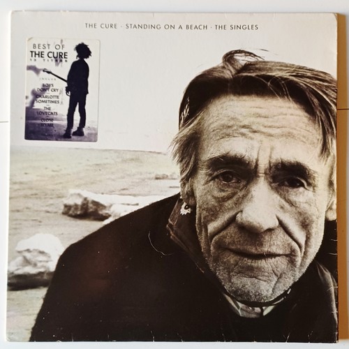 The cure standing a beach - cure, "standing