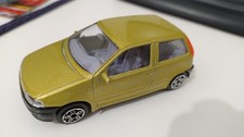 Modellino Burago Fiat Punto oro - scala 1/43