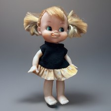 Adorable Poupée Grimace