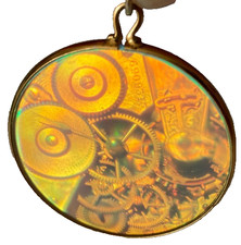 Ciondolo Steampunk con olografia movimento orologio/bordo in oro giallo 9 carati