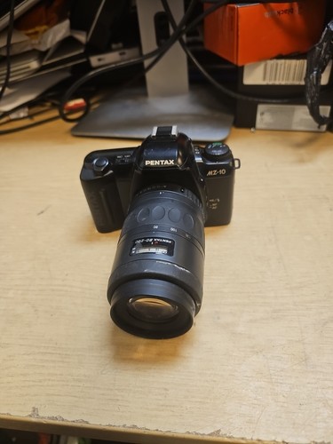 Pentax con obiettivo - con,