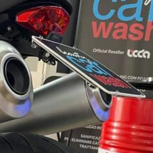 Copri targa moto plastica - in,